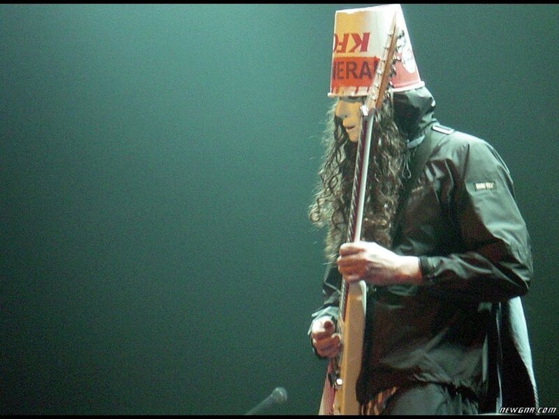 musician with bucket on head