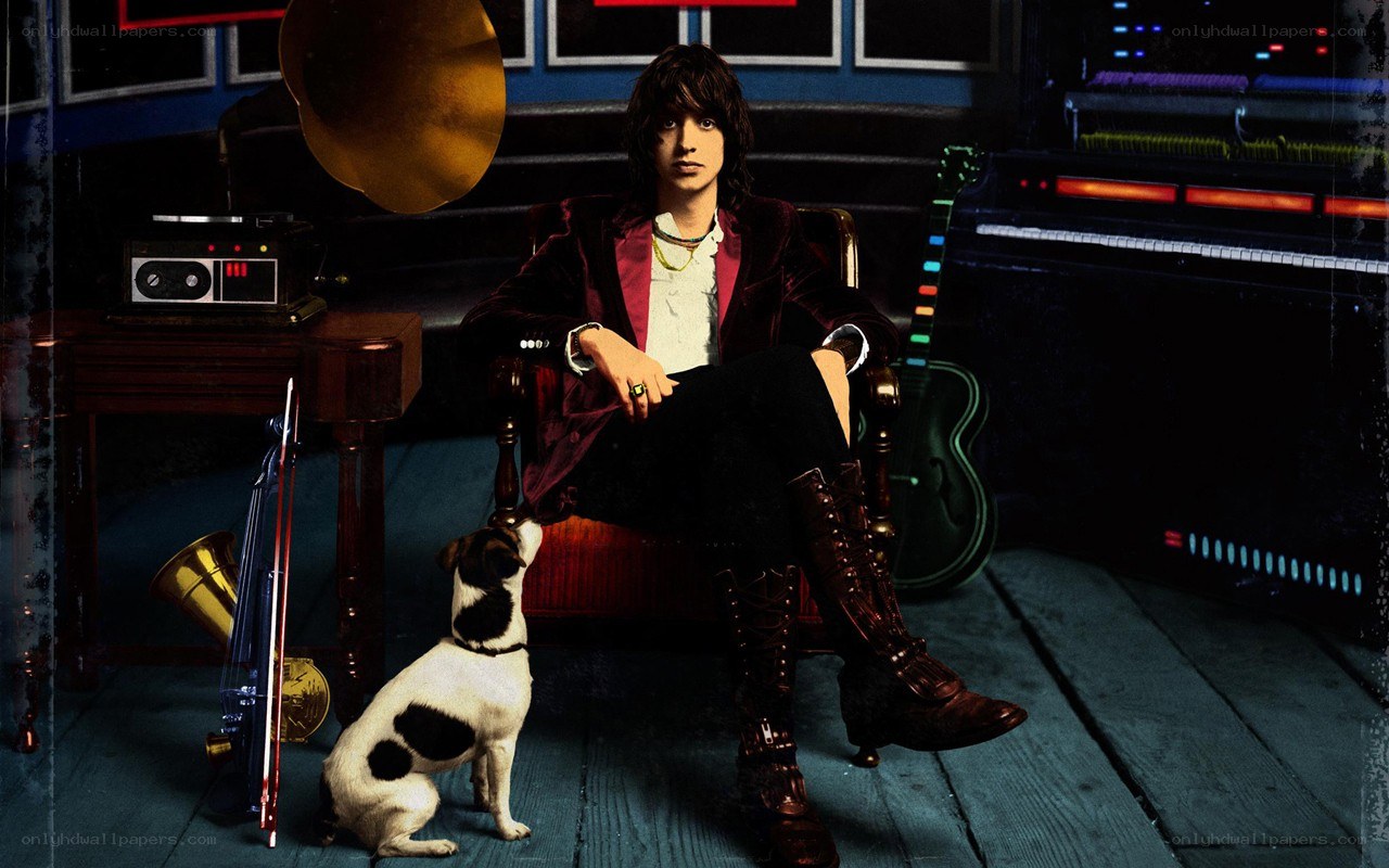 Musician with dog in studio