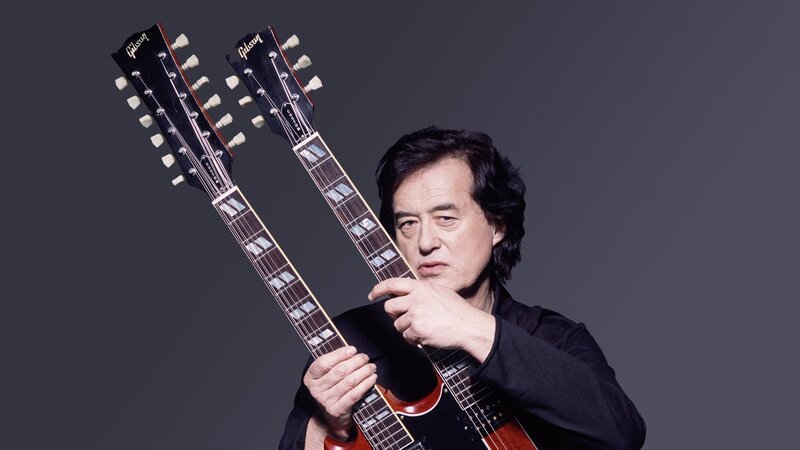 Musician with double-neck guitar