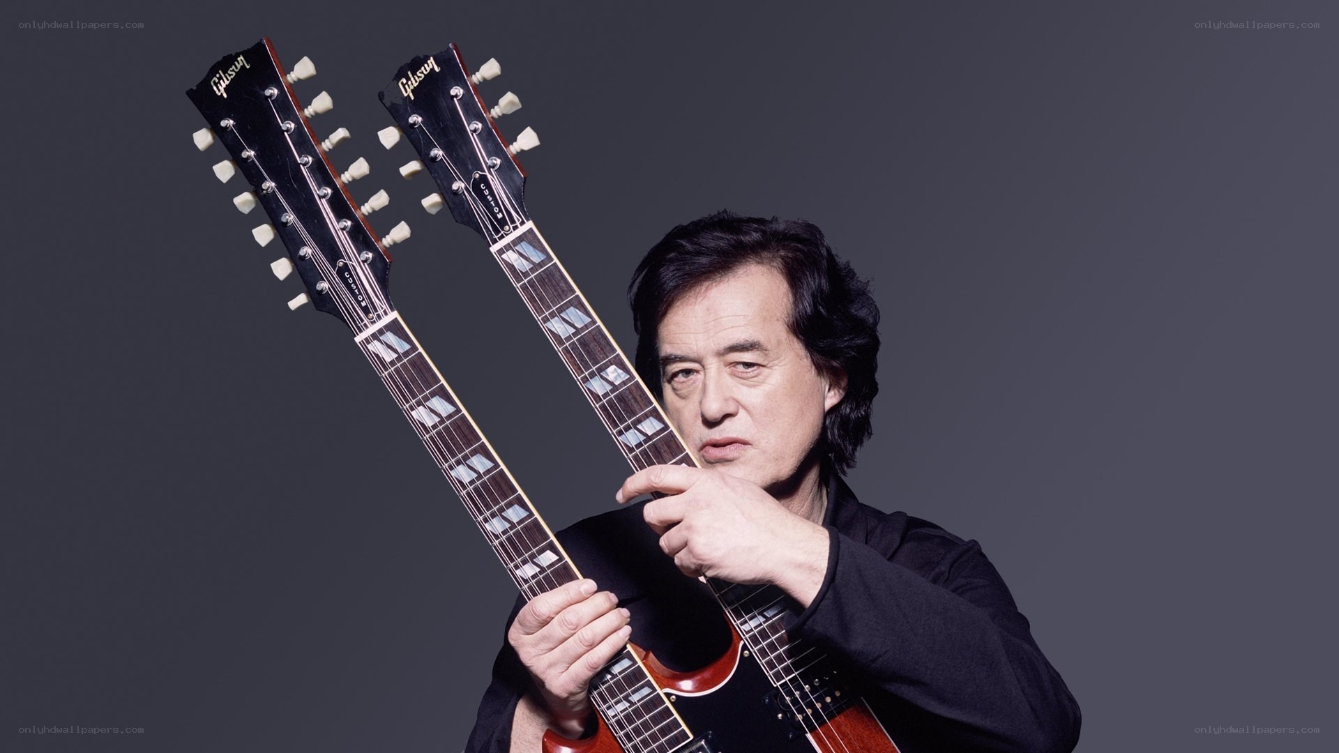 Musician with double-neck guitar