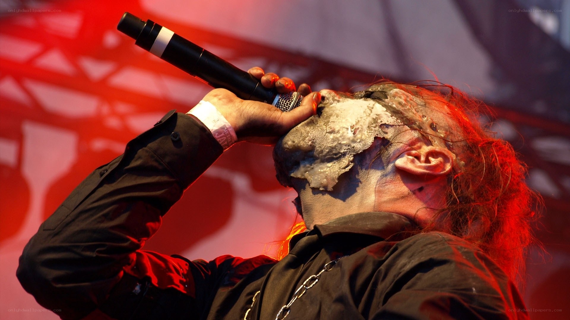 Musician with face paint performing