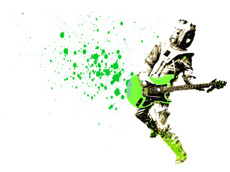 musician with green guitar