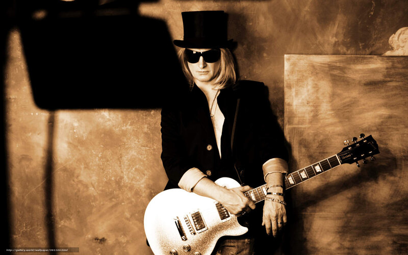 musician with guitar and top hat