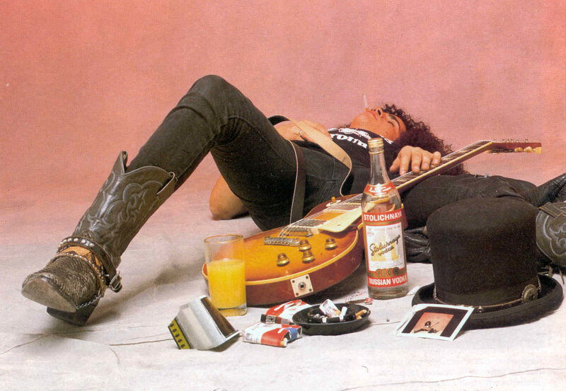 Musician with guitar and vodka