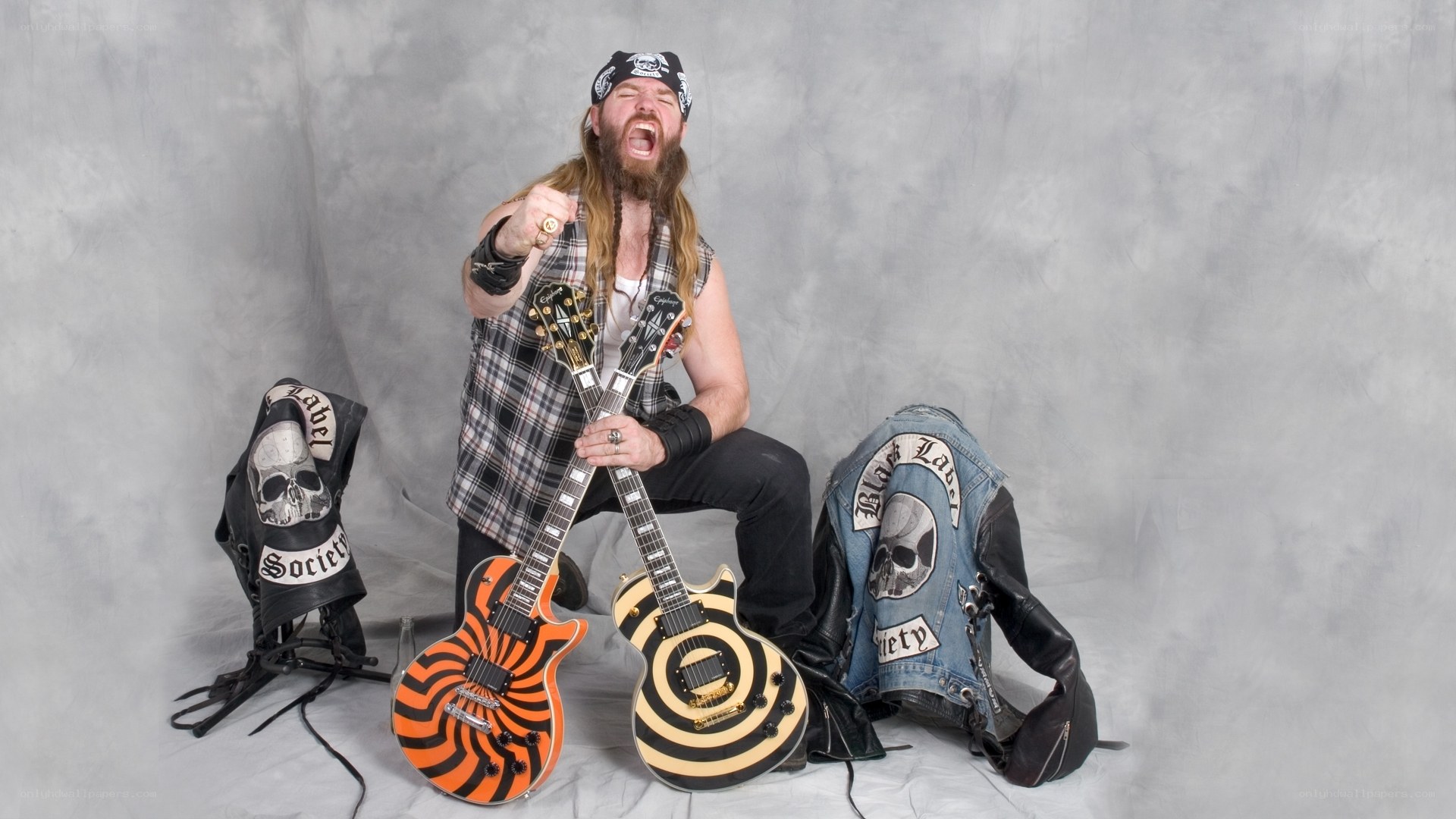 Musician with guitars and jackets