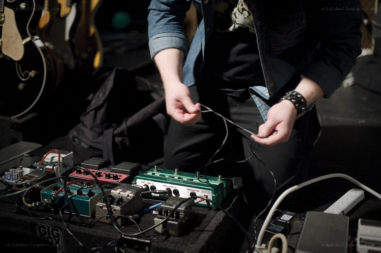 musician with pedalboard