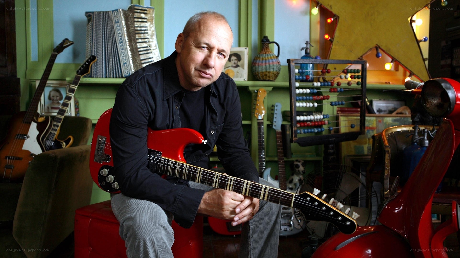 Musician with red guitar