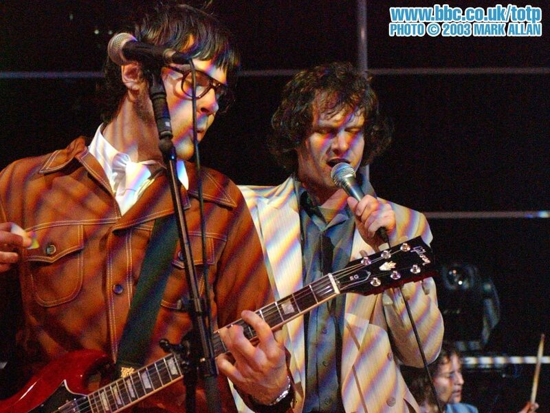 musicians performing on stage