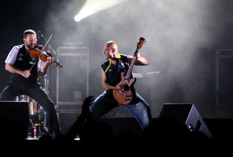 Musicians Performing on Stage — Black, Dramatic