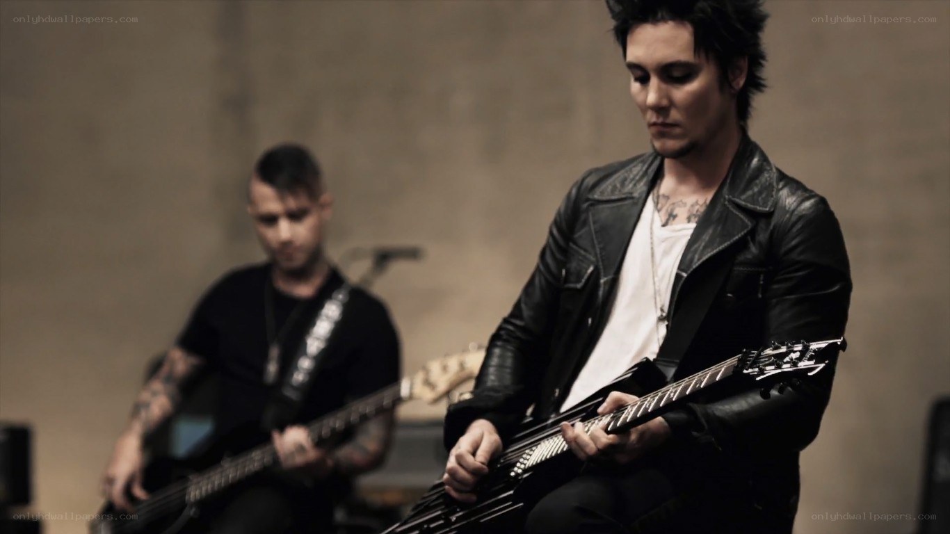 Musicians playing electric guitars