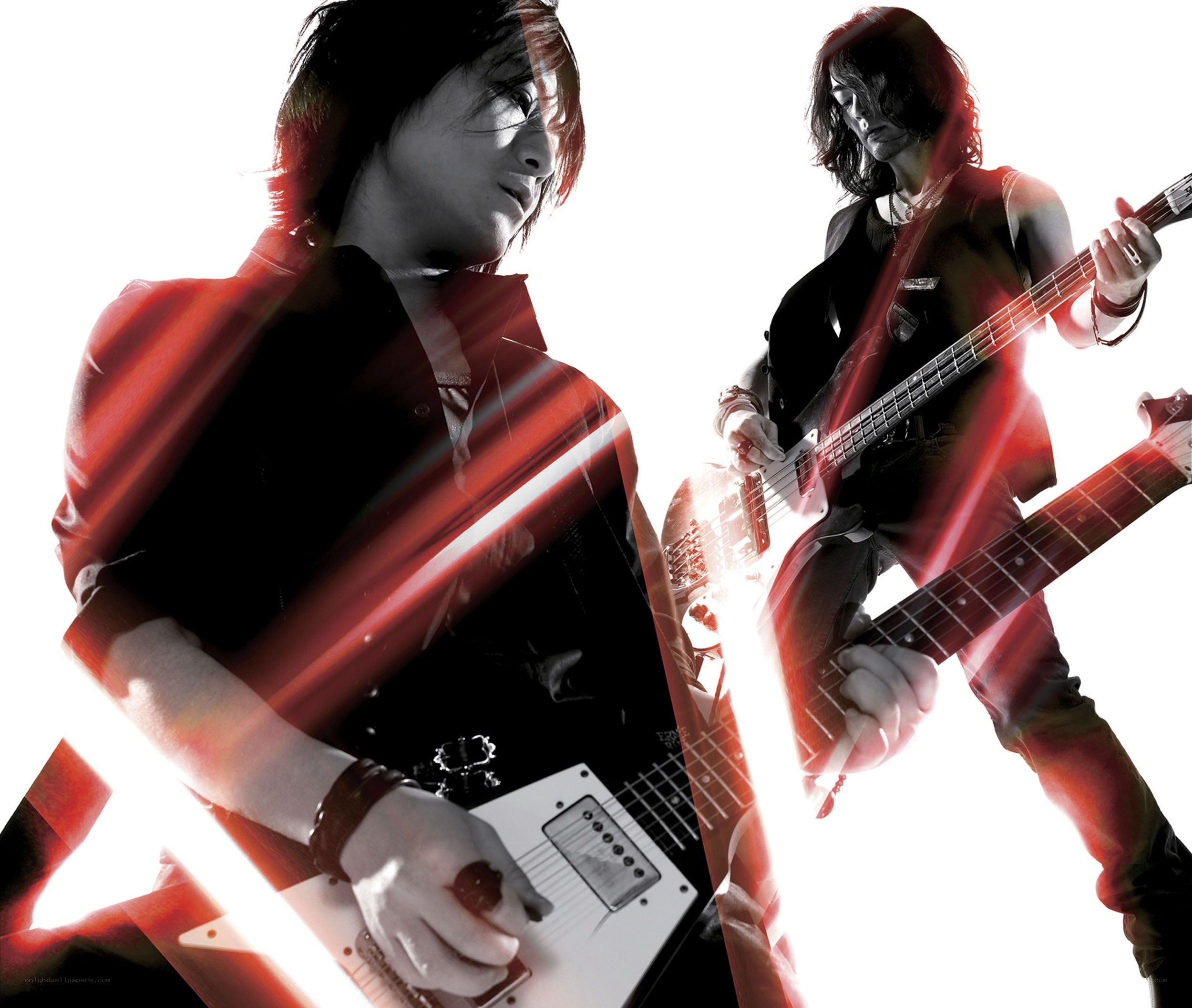 Musicians playing electric guitars