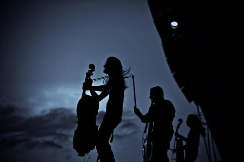 Musicians Silhouetted on Stage