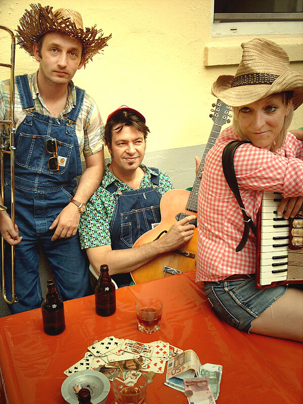 Musicians with instruments and drinks