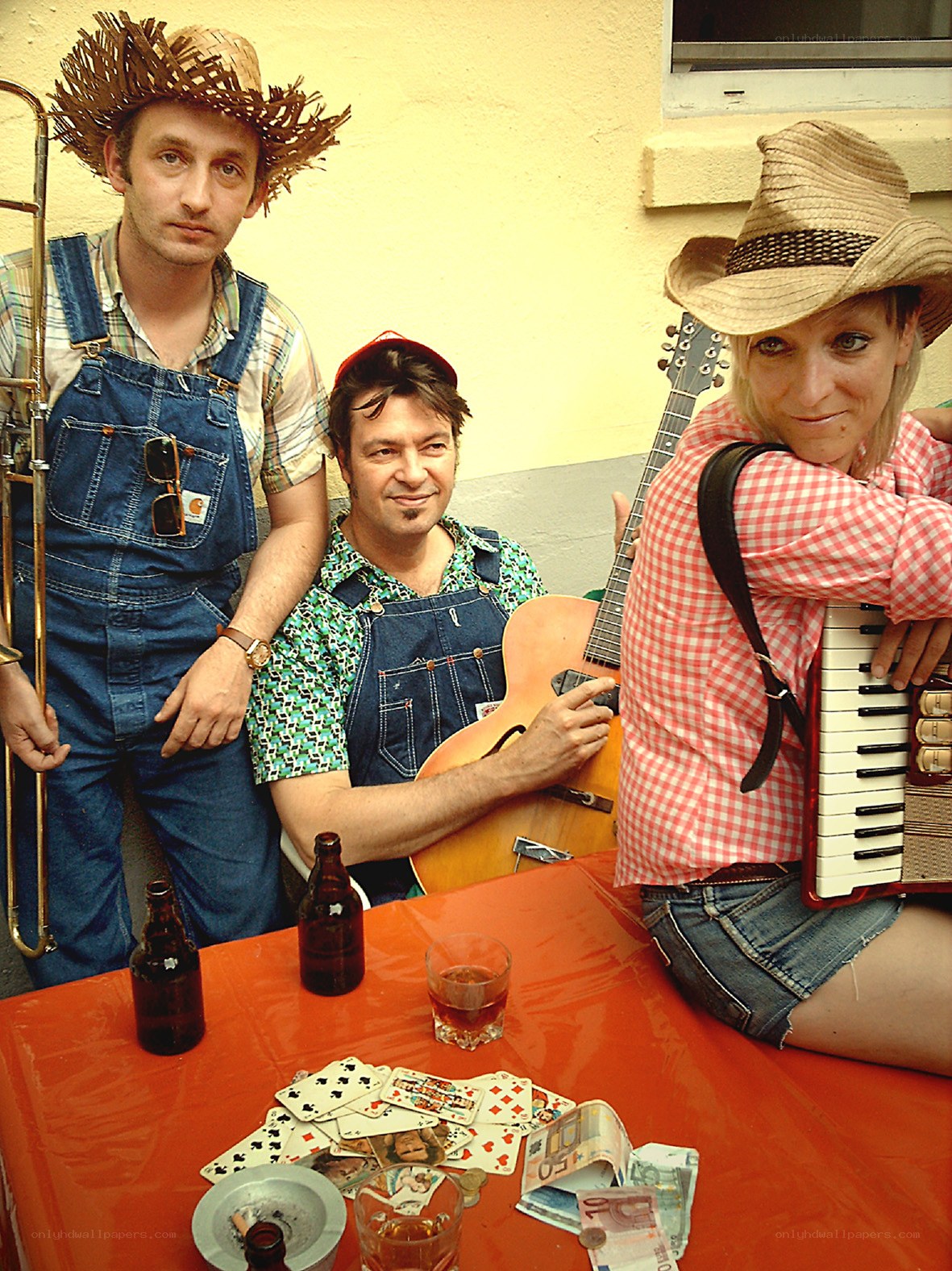 Musicians with instruments and drinks