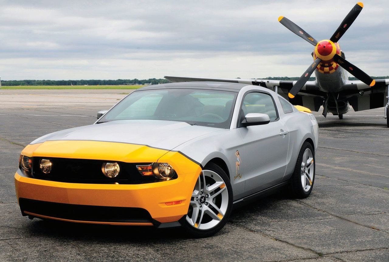 Mustang with vintage plane