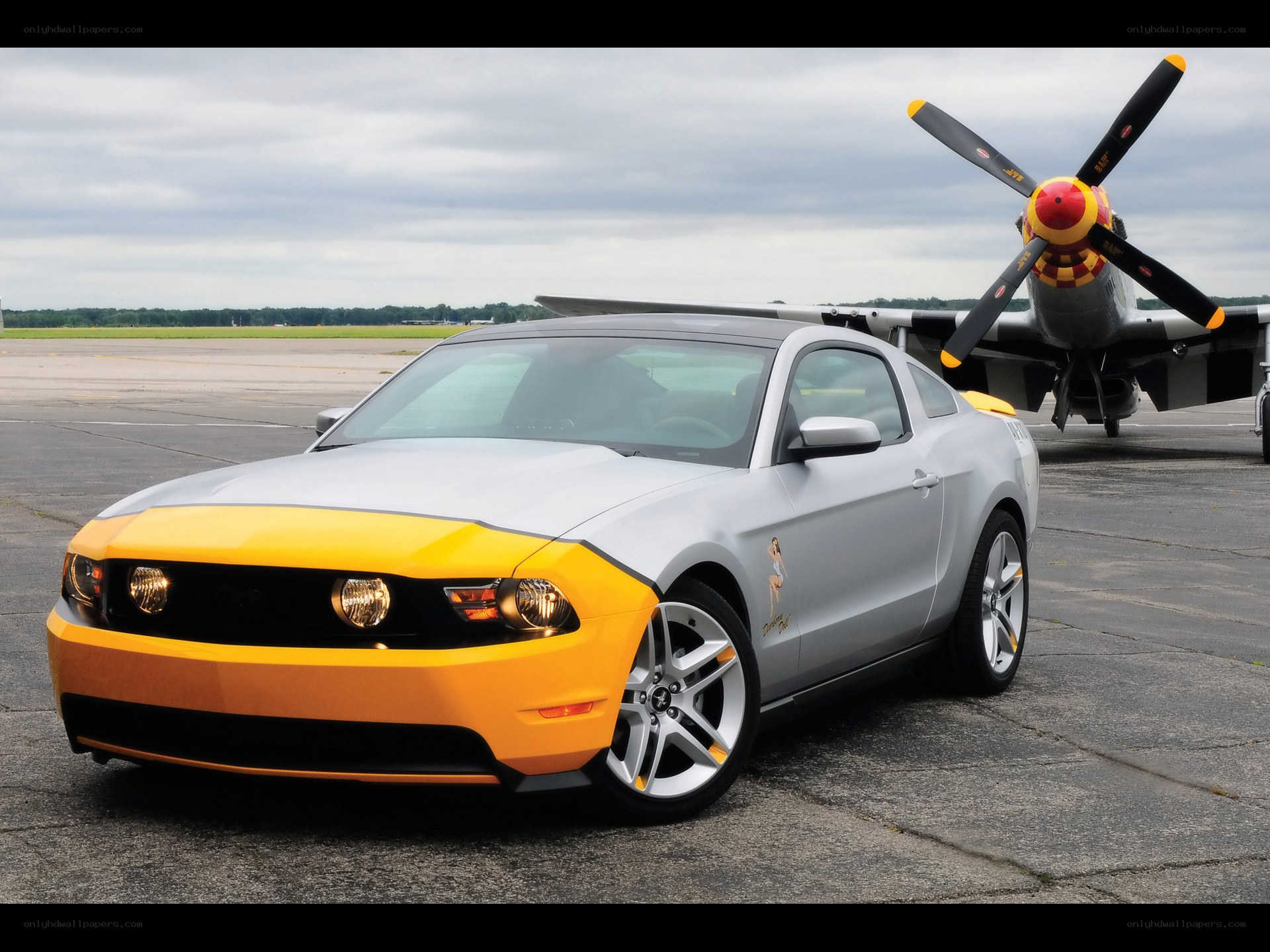 Mustang with vintage plane