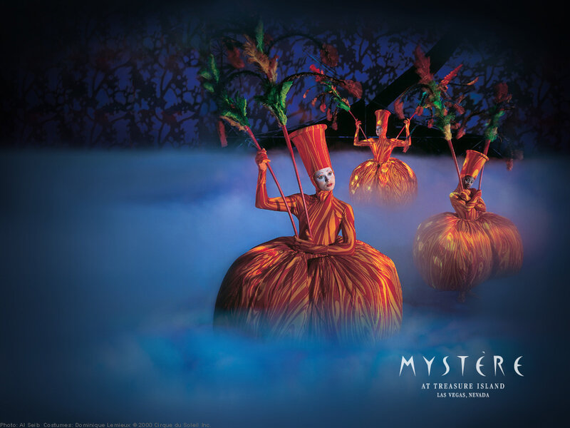 Mystère performers at night
