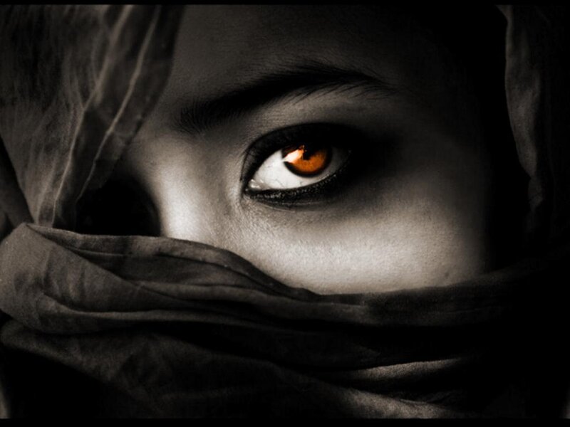mysterious eye behind cloth
