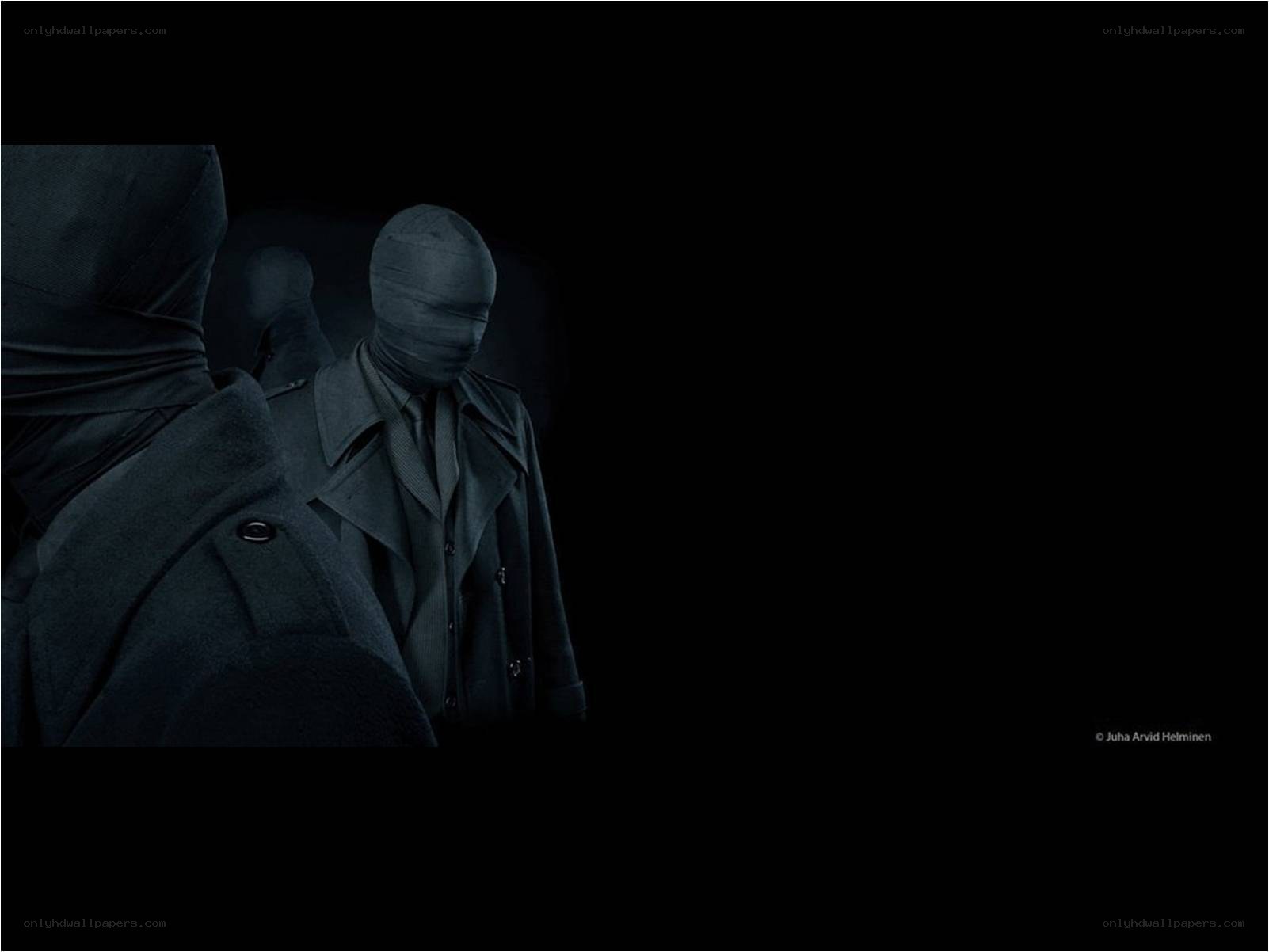 mysterious figures in dark coats