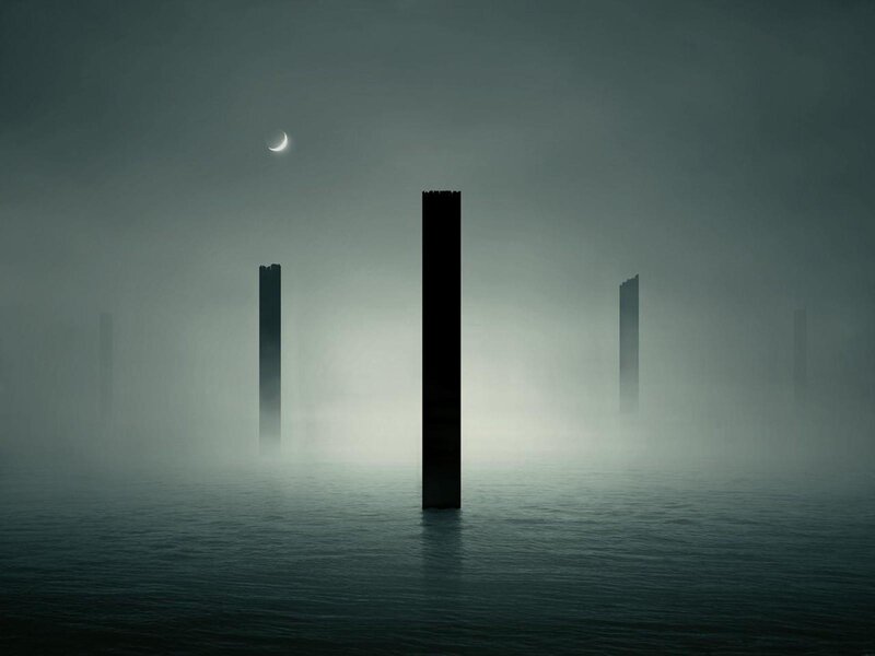 Mysterious pillars in foggy water