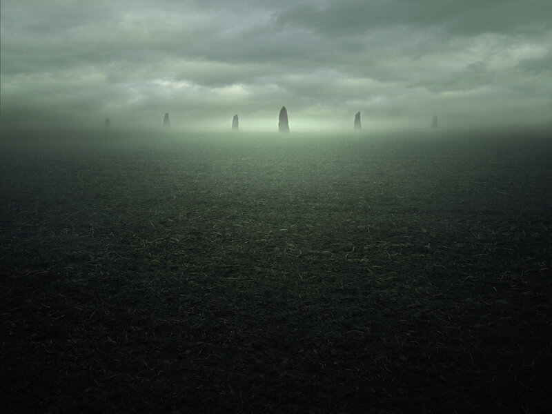 Mysterious stone pillars in fog