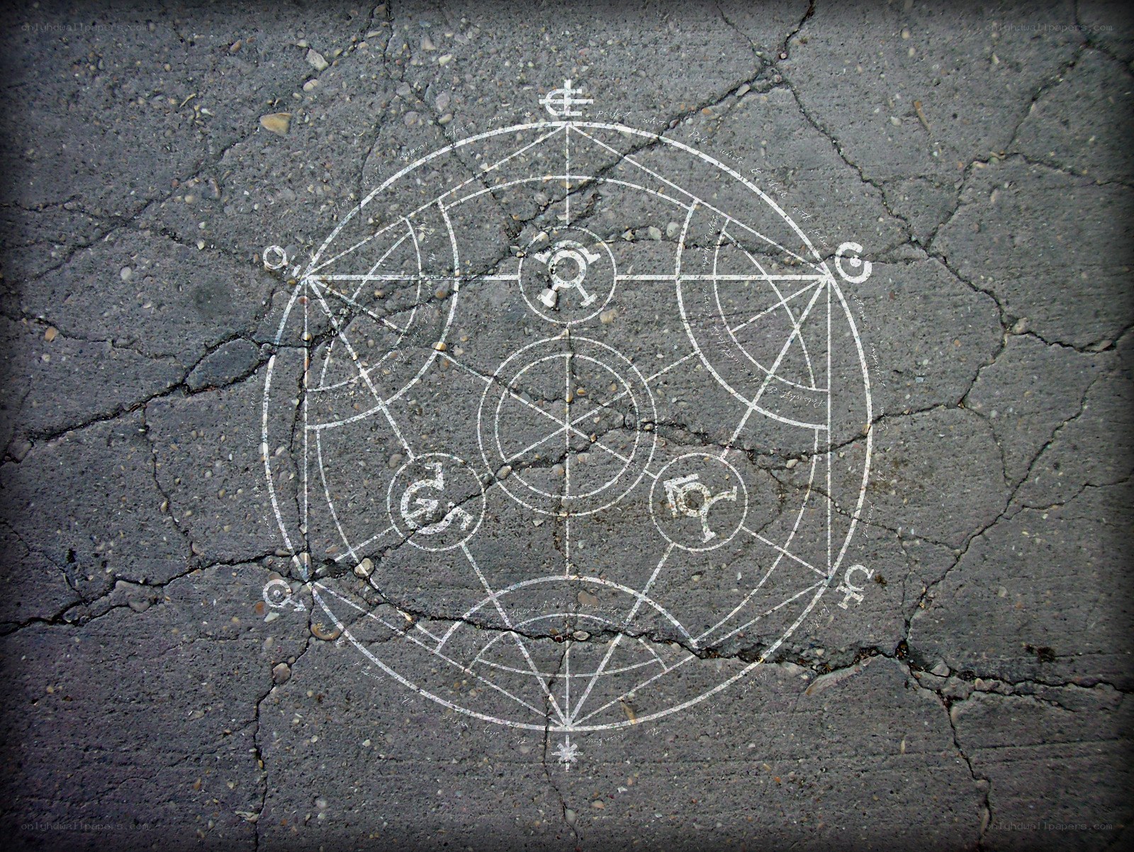 mystical symbol on cracked pavement