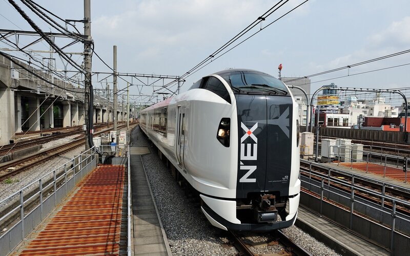 N'EX train at a station