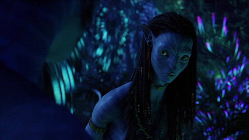 Na'vi character in bioluminescent forest