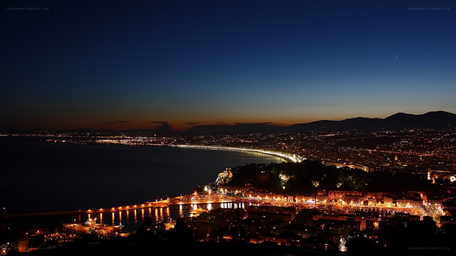Naples at night from a hill