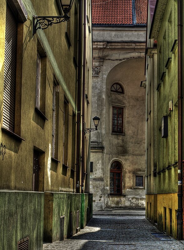narrow alley with old buildings
