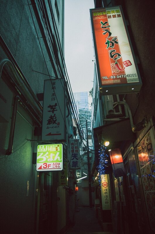 Narrow Alley with Signs