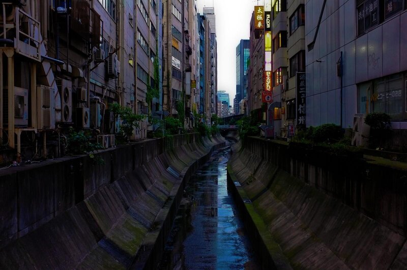 Narrow canal in urban Japan