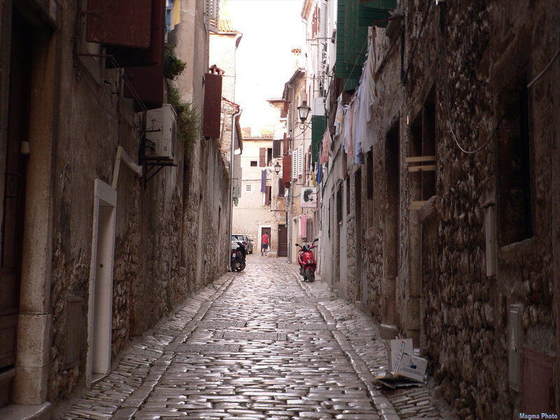 narrow cobblestone alley in old town
