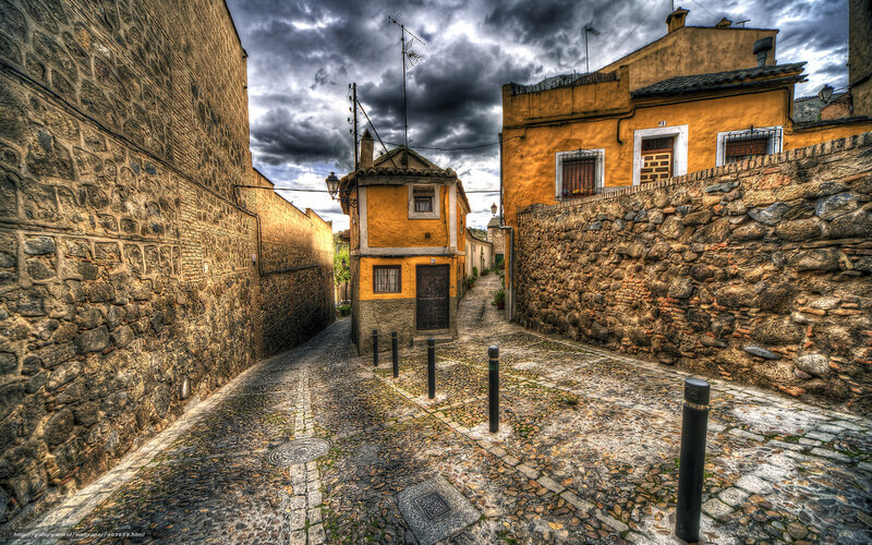 narrow cobblestone alley in old town