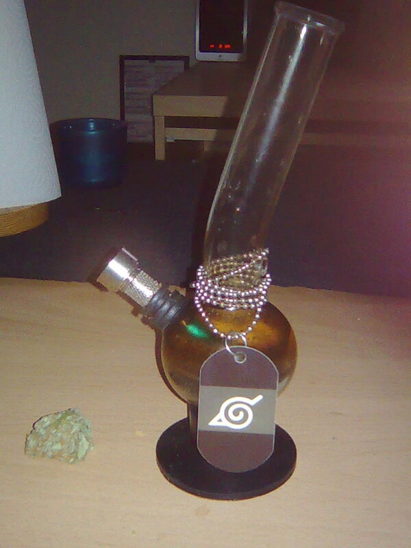 Naruto-themed bong on table