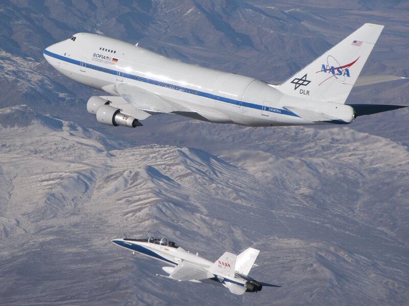 NASA SOFIA and fighter jet in flight