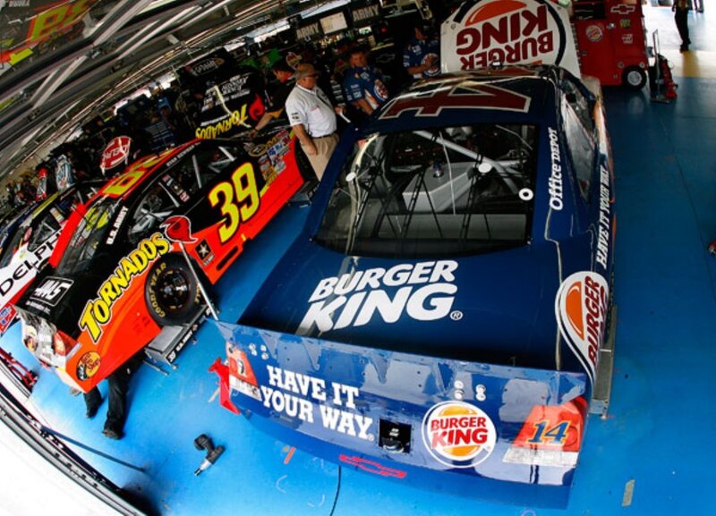 NASCAR cars in pit lane