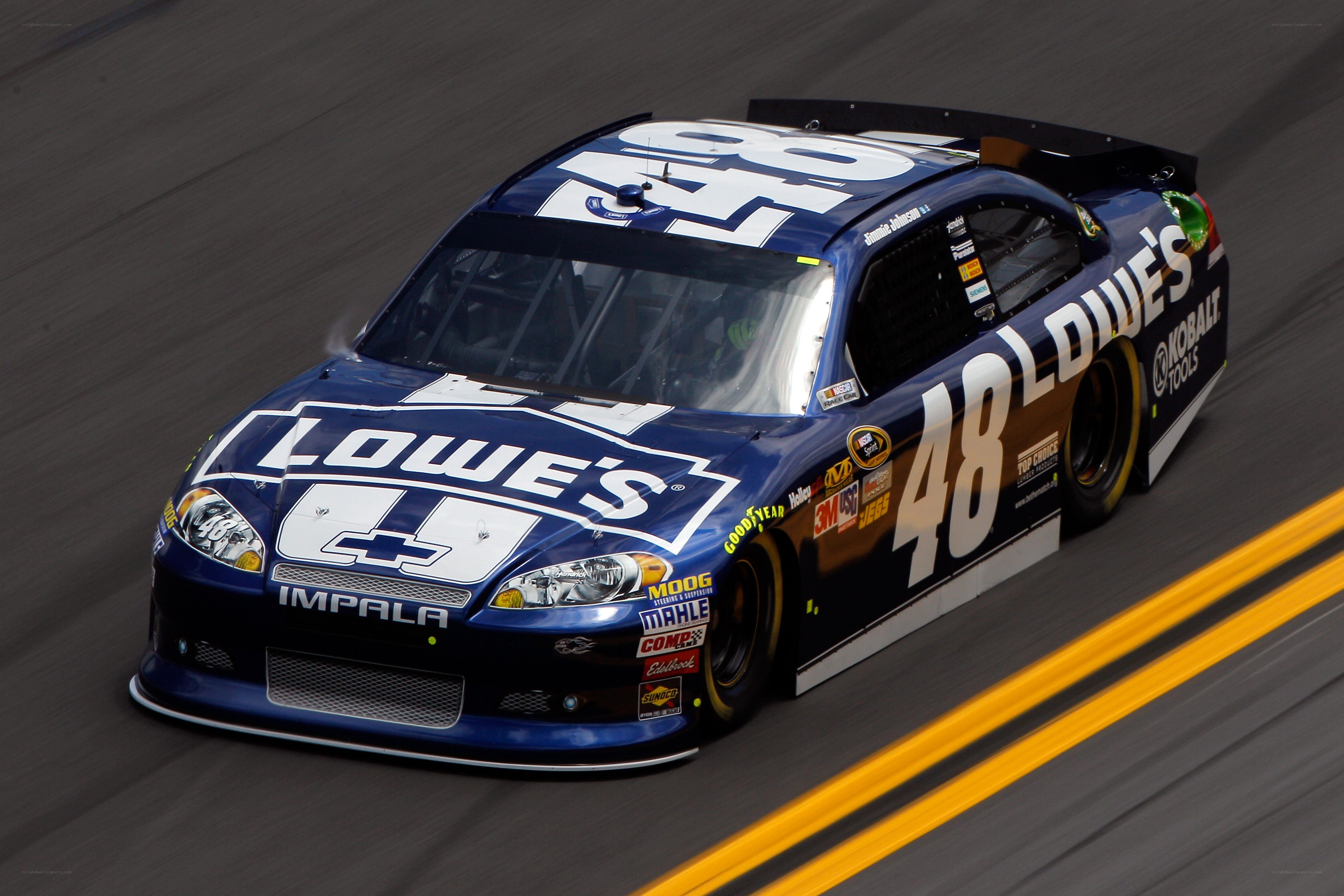 NASCAR race car in motion