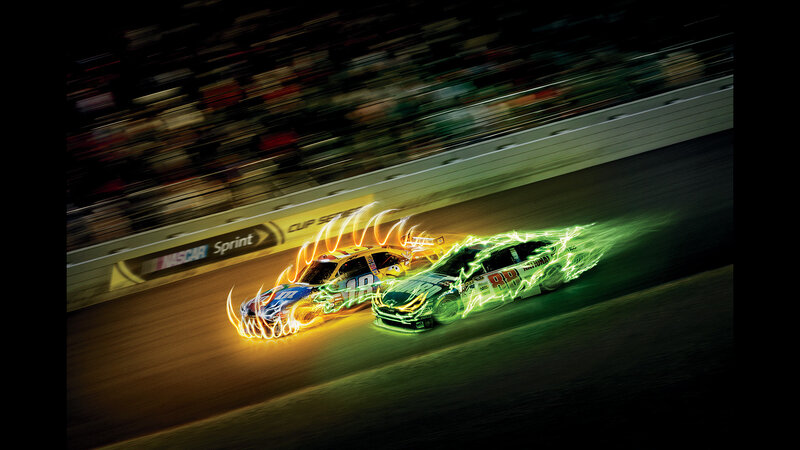 NASCAR race cars in motion
