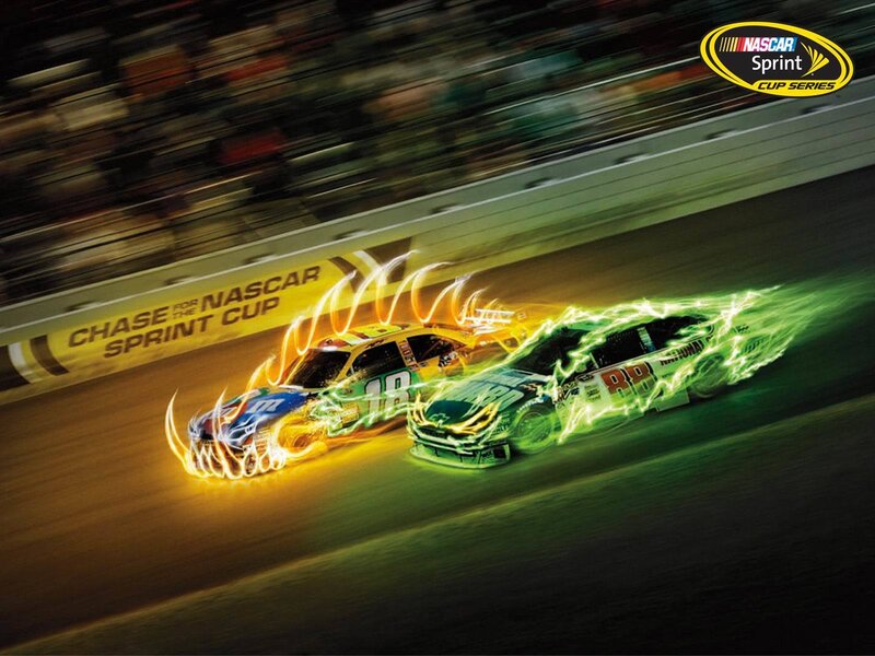 NASCAR race cars in motion