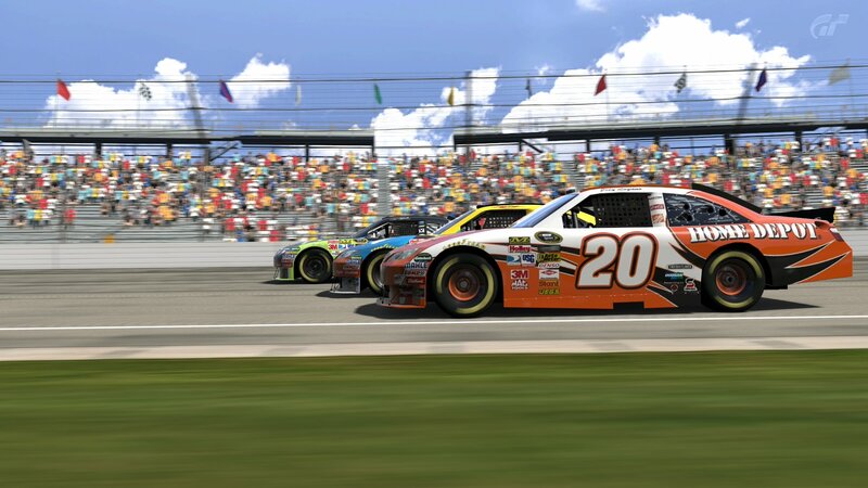 NASCAR race cars on track