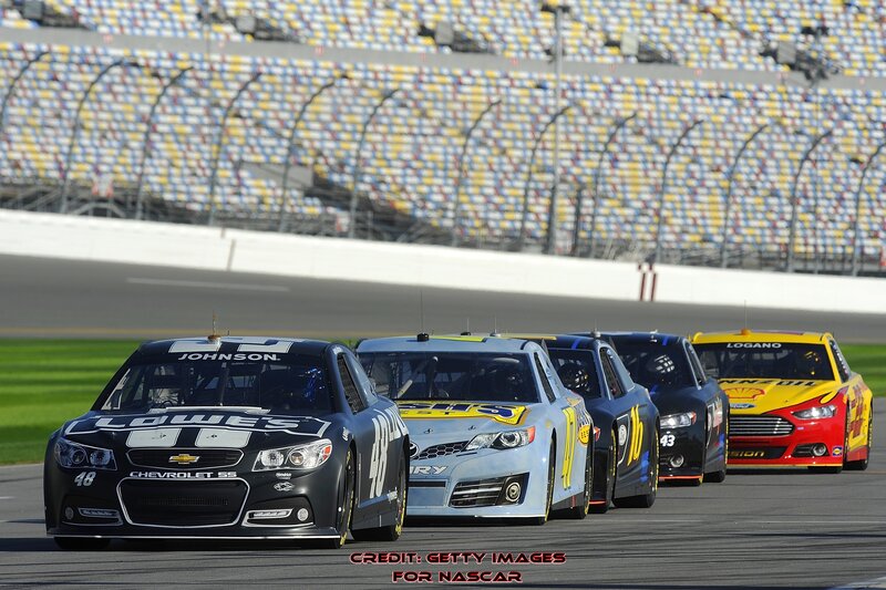 NASCAR race cars on track