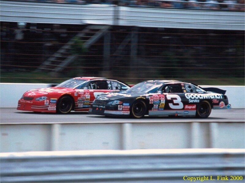 NASCAR race cars on track