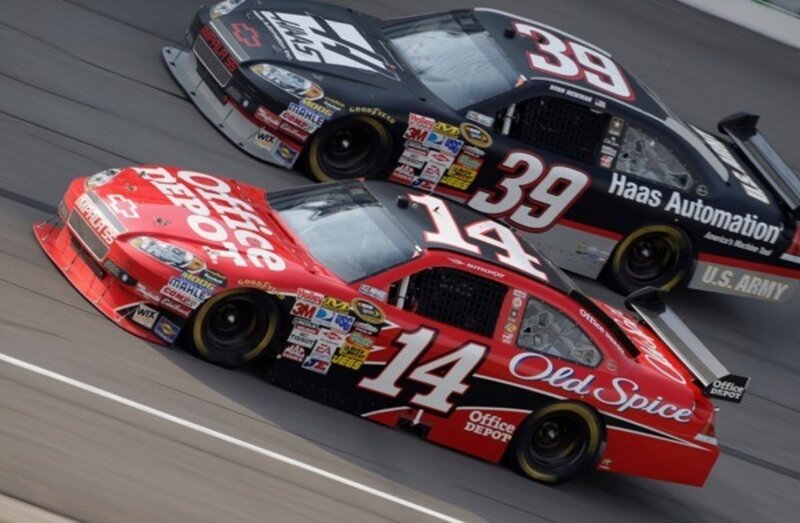 NASCAR race cars on track