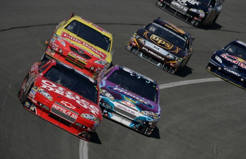 NASCAR race cars on track