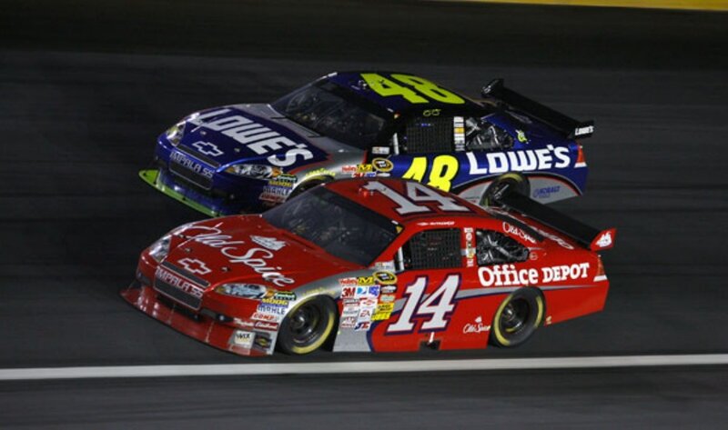 NASCAR race cars on track