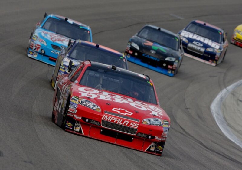 NASCAR race cars on track