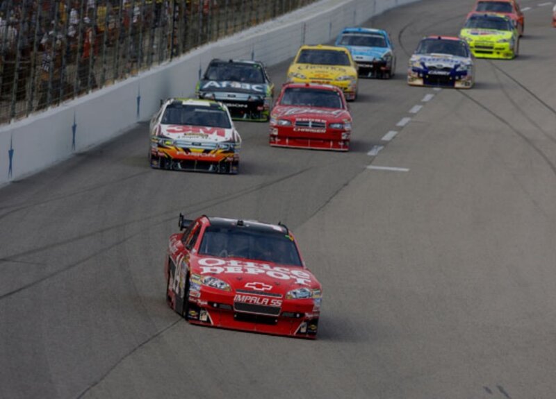 NASCAR race cars on track