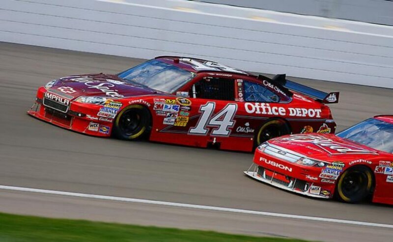 NASCAR race cars on track