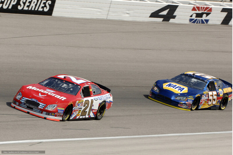 NASCAR race cars on track
